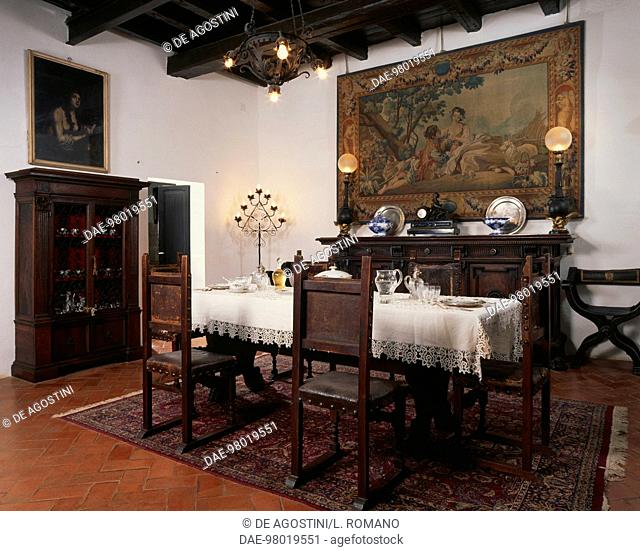 Dining room with Renaissance-style furniture, Sanluri castle, Sardinia, Italy. Sanluri, Castle of Sanluri