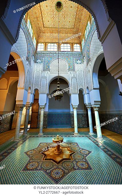 Inner fountain courtyard with Berber Mocarabe Honeycomb work plaster decorations and Berber design tiles of the Mauseleum of Moulay Ismaïl Ibn Sharif