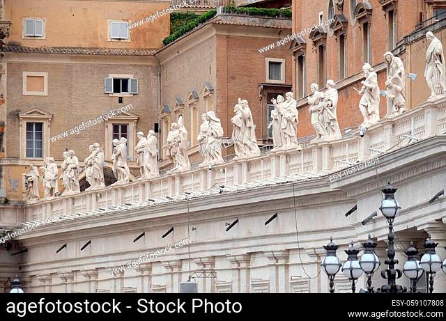Gallery of saints, fragment of colonnade of St. Peters Basilica in Vatican