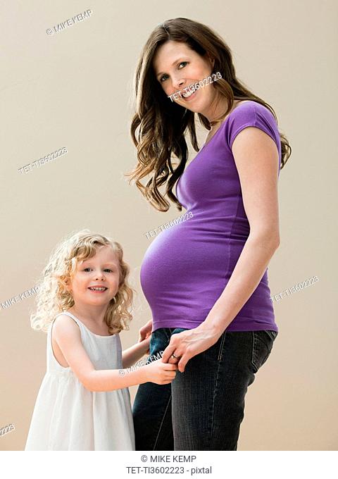 USA, Utah, Lehi, Portrait of girl 2-3 and pregnant mother