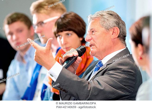 German President Joachim Gauck talks to first-time voters about federal elections at the High School Cetnre Handel (Oberstufenzentrum Handel) in Berlin, Germany