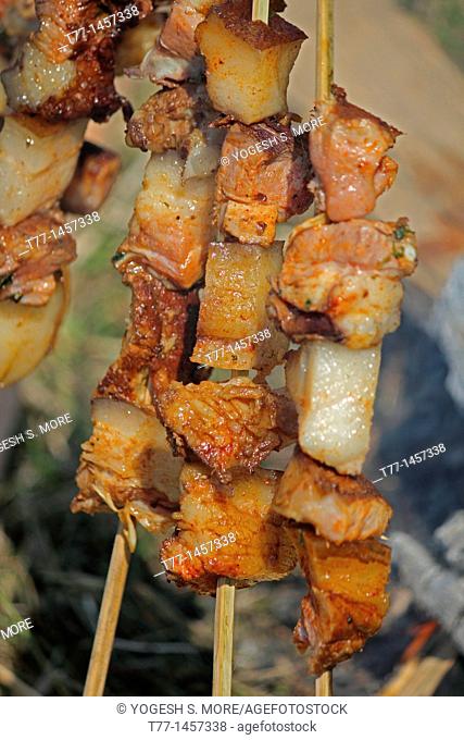 Roast pork on skewers, Miao, Arunachal Pradesh, India