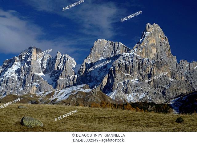 Autumn view of the peaks of Cima dei Bureloni (3130 m), Cima della Vezzana (3192 m), and Cimon della Pala (3184 m), Rolle Pass, Pala Group