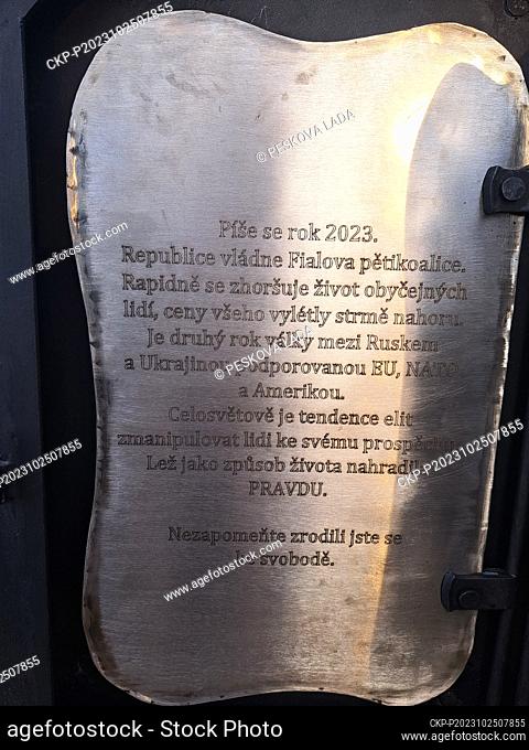 One of the pages behind the door in the stone pedestal of the forged sculpture of the Wings of Hope at the Koterov scenic viewpoint above Pilsen, Czech Republic
