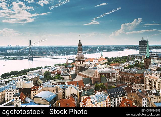 Riga, Latvia. Riga Cityscape Slyline In Sunny Summer Day. Famous Landmarks - Riga Dome Cathedral And St. James's Cathedral, or the Cathedral Basilica of St