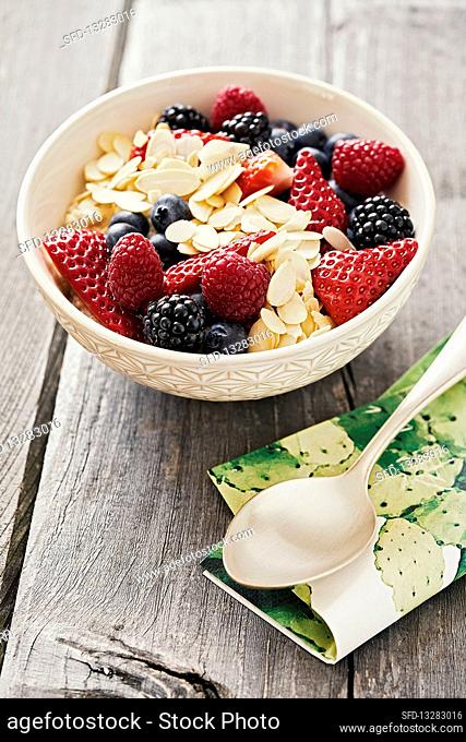 Californian porridge with fresh berries and flaked almonds