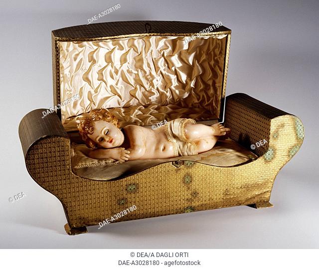 Music box with automaton of a sleeping child, wax. Italy, 20th century.  Savio, Museo Di Strumenti Musicali Meccanici Marino Marini (Music Museum)