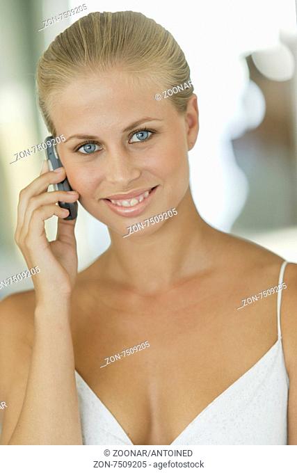 Young sexy woman with mobile phone, Portrait
