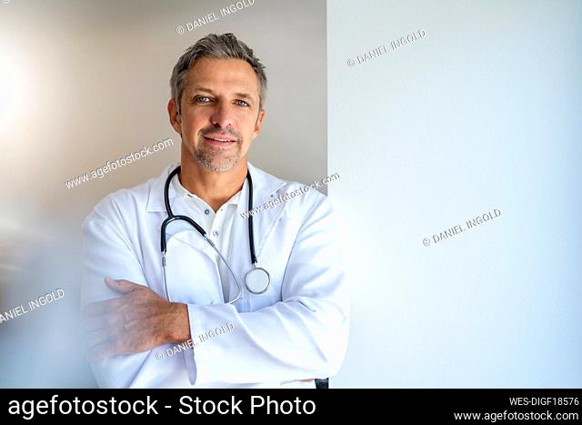 Portrait of confident doctor with arms crossed