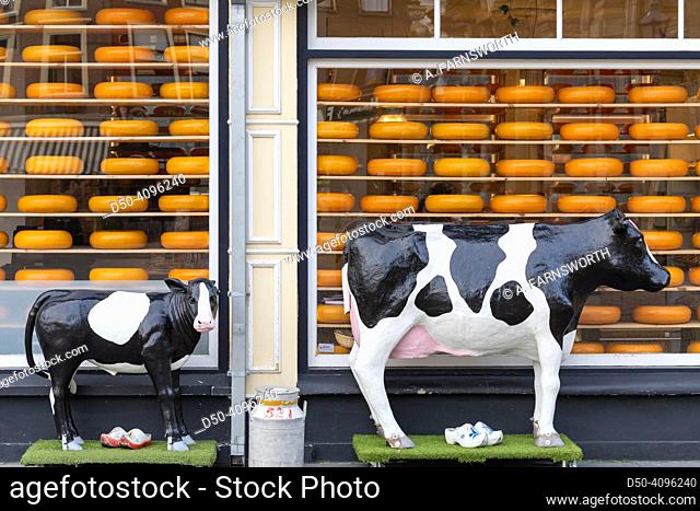 Delf, Netherlands The facade of a local cheese shop and figure cows
