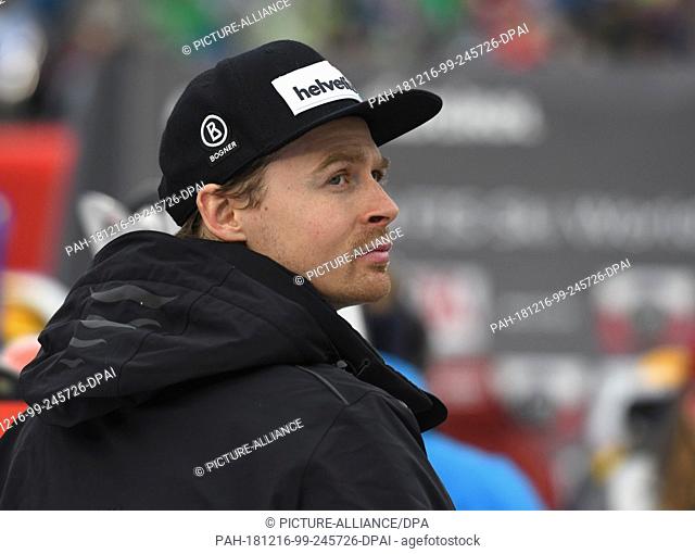 16 December 2018, Italy, Alta Badia: Ski racer Stefan Luitz looks at a video wall after the final of the Alta Badia giant slalom