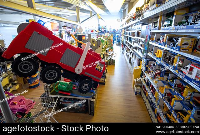03 April 2020, Bavaria, Nuremberg: The premises and shelves in a toy store Schweiger are full and the store, like many other stores