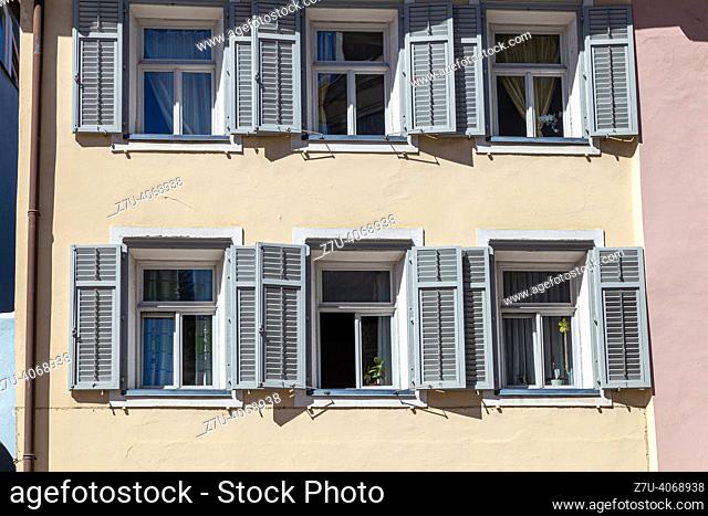 windows in the facades of beautiful houses