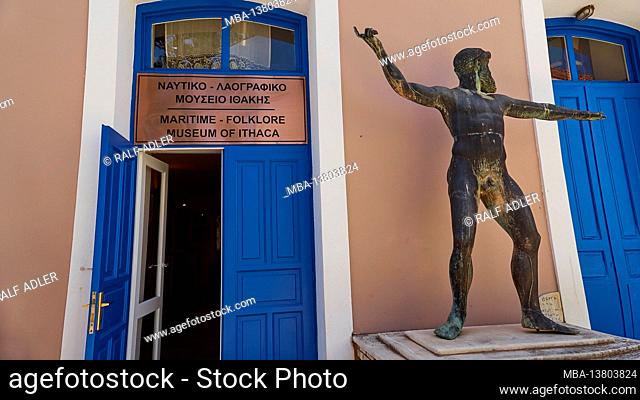 Ionian Islands, Ithaca, island of Ulysses, capital, Vathi, Maritime and Folklore Museum of Ithaca, blue entrance door, next to it a statue of Ulysses