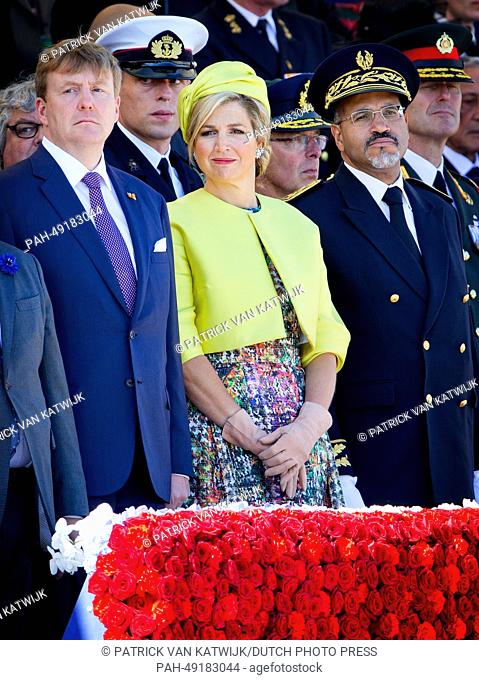 Dutch King Willem-Alexander (L) and Queen Maxima attend the D-Day commemoration to mark the 70th anniversary of the Allied landings on D-Day, in Arromanches