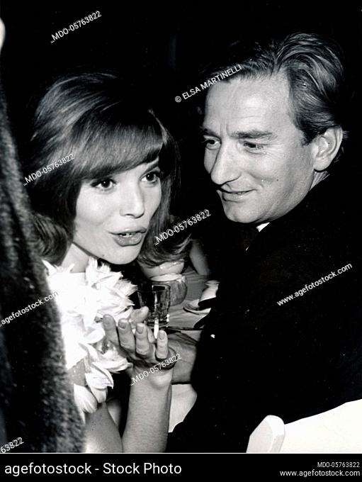 Italian actress Elsa Martinelli with a man. 1960s