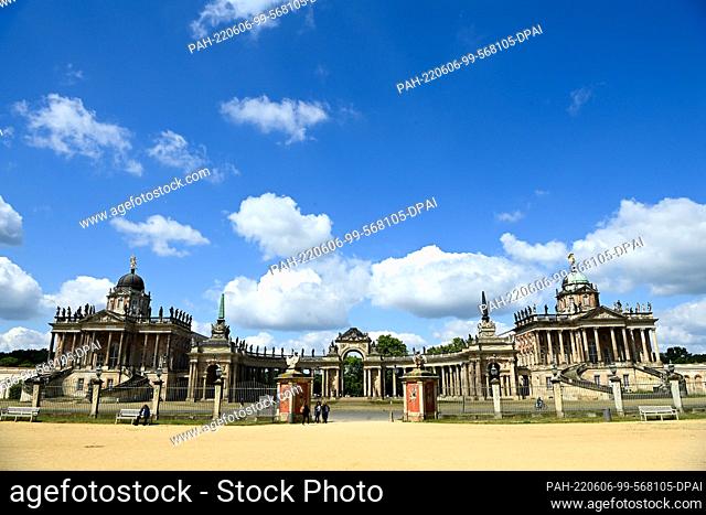 02 June 2022, Brandenburg, Potsdam: The Colonnades with the Communs and the Triumphal Gate in Sanssouci Palace Park. These representative buildings were erected...