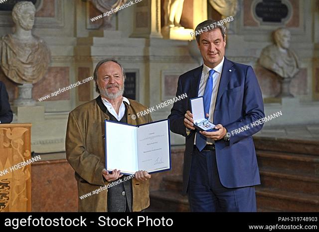Fredl FESL (musician) receives the Bavarian Order of Merit from Markus SOEDER (Prime Minister of Bavaria and CSU Chairman)