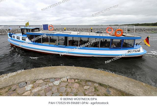 The excursion boat ""Forelle""Â sets off on an excursion on Kummerower See lake from the harbour of Kummerow, Germany, 25 May 2017