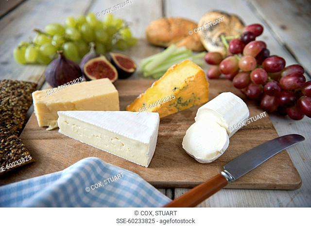 Cheeseboard, fruit , bread and crackers