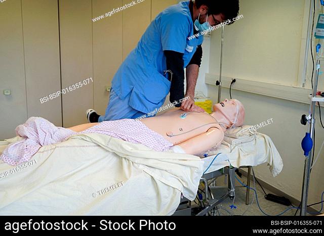 Anesthesiologist students during a critical situation resuscitation exercise at the Nimes Faculty of Medicine. Students train on a Sim Man 3 G robotic dummy