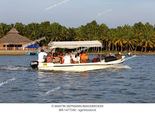 Boat with tourists and suitcases on the Poovar River, backwater, Puvar, Kerala, South India, India, Asia