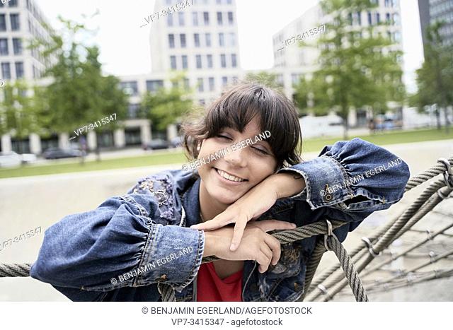 Young woman in park, Munich, Germany
