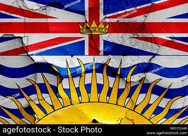 flag of British Columbia painted on cracked wall