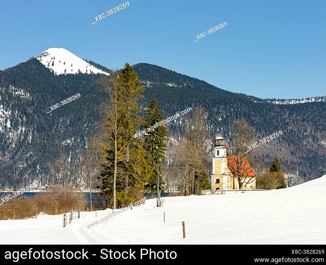 Church Sankt Margareth at Zwergern Spitz. Lake Walchensee near village Einsiedl in the snowy bavarian Alps. Europe Germany, Bavaria