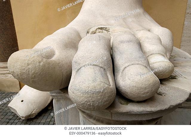Foot of statue of Emperor Constantine II at courtyard of Palazzo dei Conservatori, Capitoline Museum. Rome. Italy