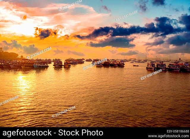 Boats on Mumbai water at dawn. Colaba region of Mumbai, Maharashtra, India