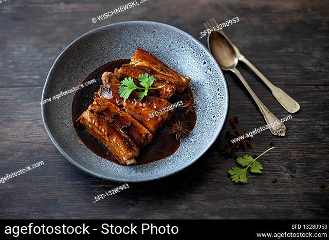 Thai pork ribs with anise, peppercorns, garlic and coriander