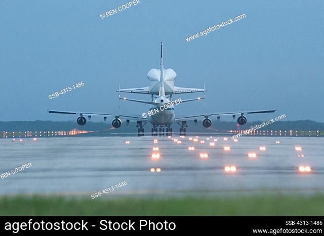 USA, Florida, Cape canaveral, Kennedy Space Center, Rear View of Endeavour space shuttle lifting on top of 747 shuttle carrier aircraft