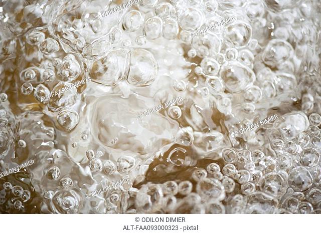 Bubbles on surface of water, full frame