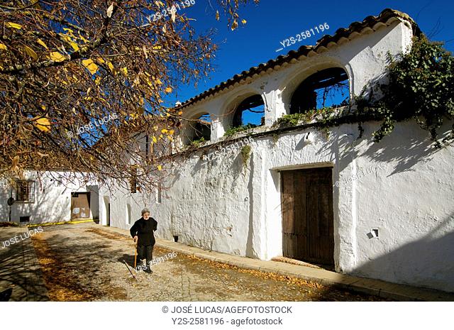 Muñiz Pablo square and old woman, Castaño del Robledo, Huelva province, Region of Andalusia, Spain, Europe