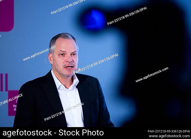 18 December 2023, North Rhine-Westphalia, Dortmund: Werner Ponikwar, Chairman of the Executive Board, speaks at the annual press conference of electrolyzer...