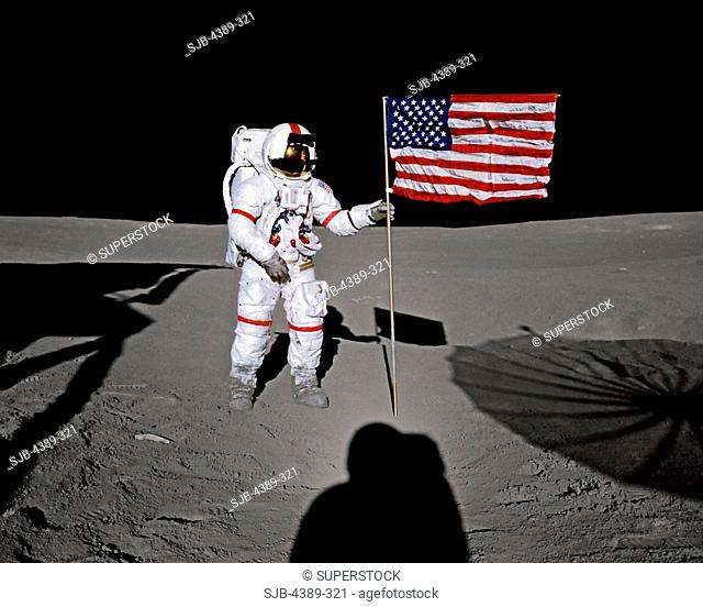 Alan Shepard Poses with An American Flag During Apollo 14