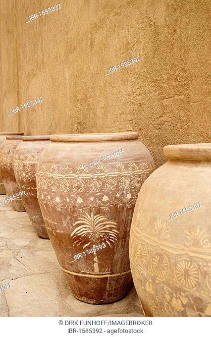 Pots from in front of adobe wall, Jabrin, Oman, Middle East