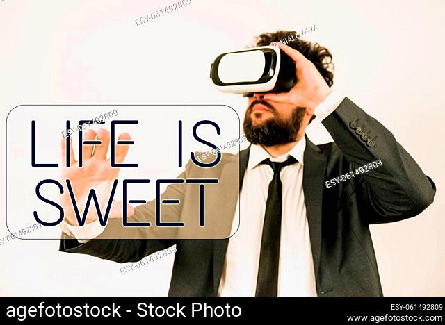Hand writing sign Life Is Sweet, Word Written on Happiness seeing the good side of events Motivation Inspire Man Wearing Vr Glasses And Presenting Important...