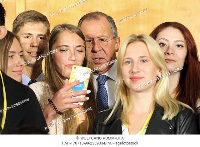 Russian Foreign Minister Sergey Lavrov takes part in the event German-Russian Year of Youth Exchange and takes a picture with Russian youths in the German...