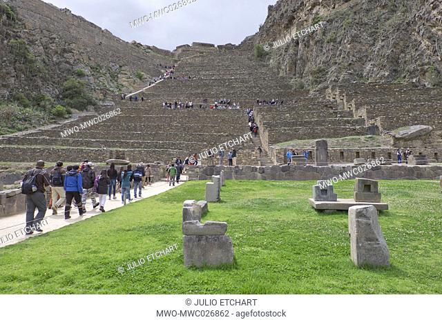 Tourists visit the ruins of the Inca archaeological site of Ollantaytambo near Cusco. Peru