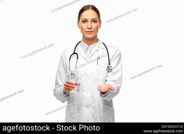 doctor with medicine and glass of water