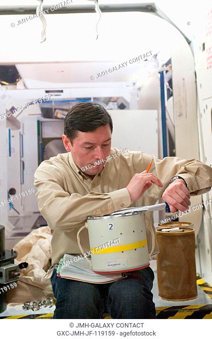 Russian cosmonaut Sergei Revin, Expedition 3132 flight engineer, participates in an emergency scenario training session in an International Space Station...
