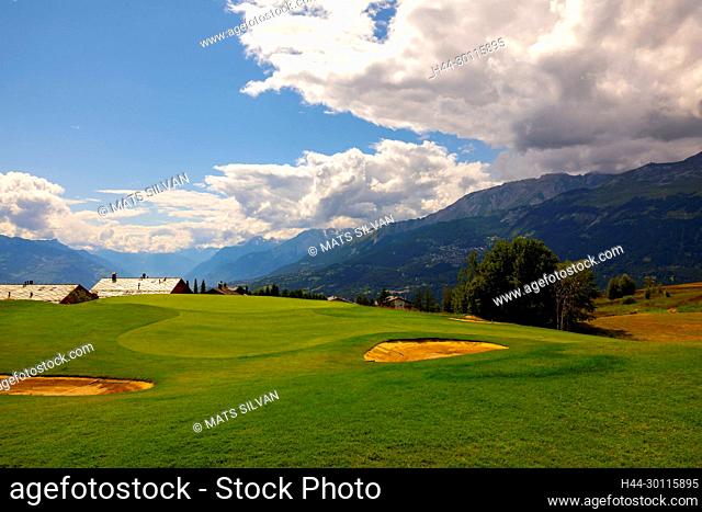 Crans Sur Sierre Golf Course with Hole 7 and Mountain View in Crans Montana in Valais, Switzerland