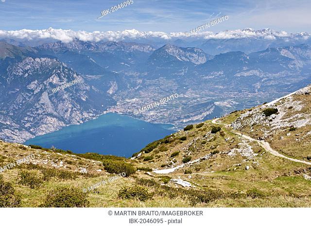 View of Lake Garda and Arco, on the way to the top of Monte Altissimo mountain above Nago-Torbole, province of Trentino, Italy, Europe