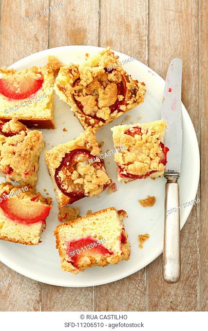 Plum crumble cake, cut into portions