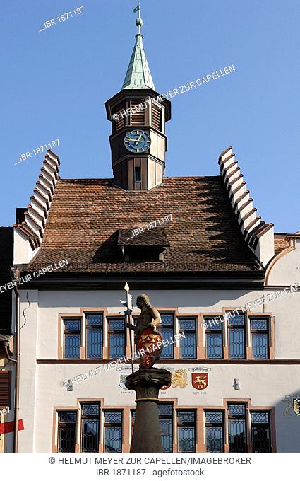 Old Town Hall, Hauptstrasse 53, with a fountain sculpture in the market square in front, Staufen, Baden-Wuerttemberg, Germany, Europe
