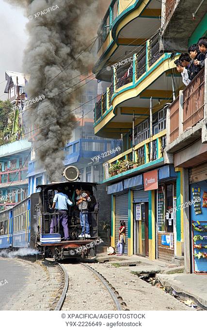 The black steam powered Darjeeling Toy Train approaches