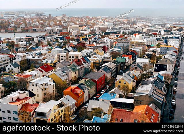 Harbor Entrance Colorful Red Green Blue Houses Houses Apartment Buildings Cars Bus Streets Ocean Reykjavik Iceland. High quality photo