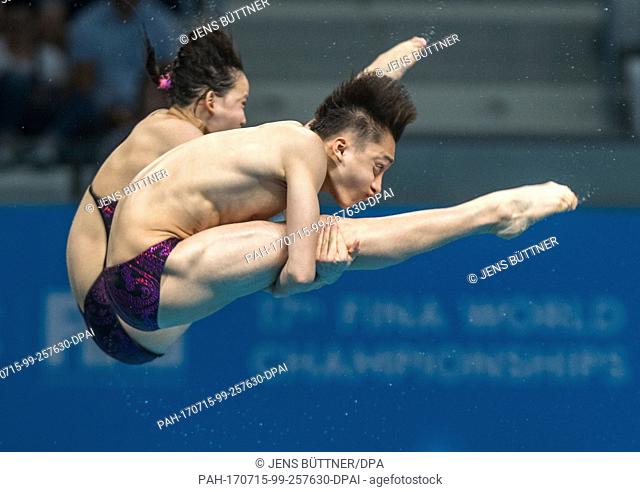 The new world champions Qian Ren and Junjie Lian from China in action during the mixed 10m platform synchronized diving finale at the FINA World Championships...